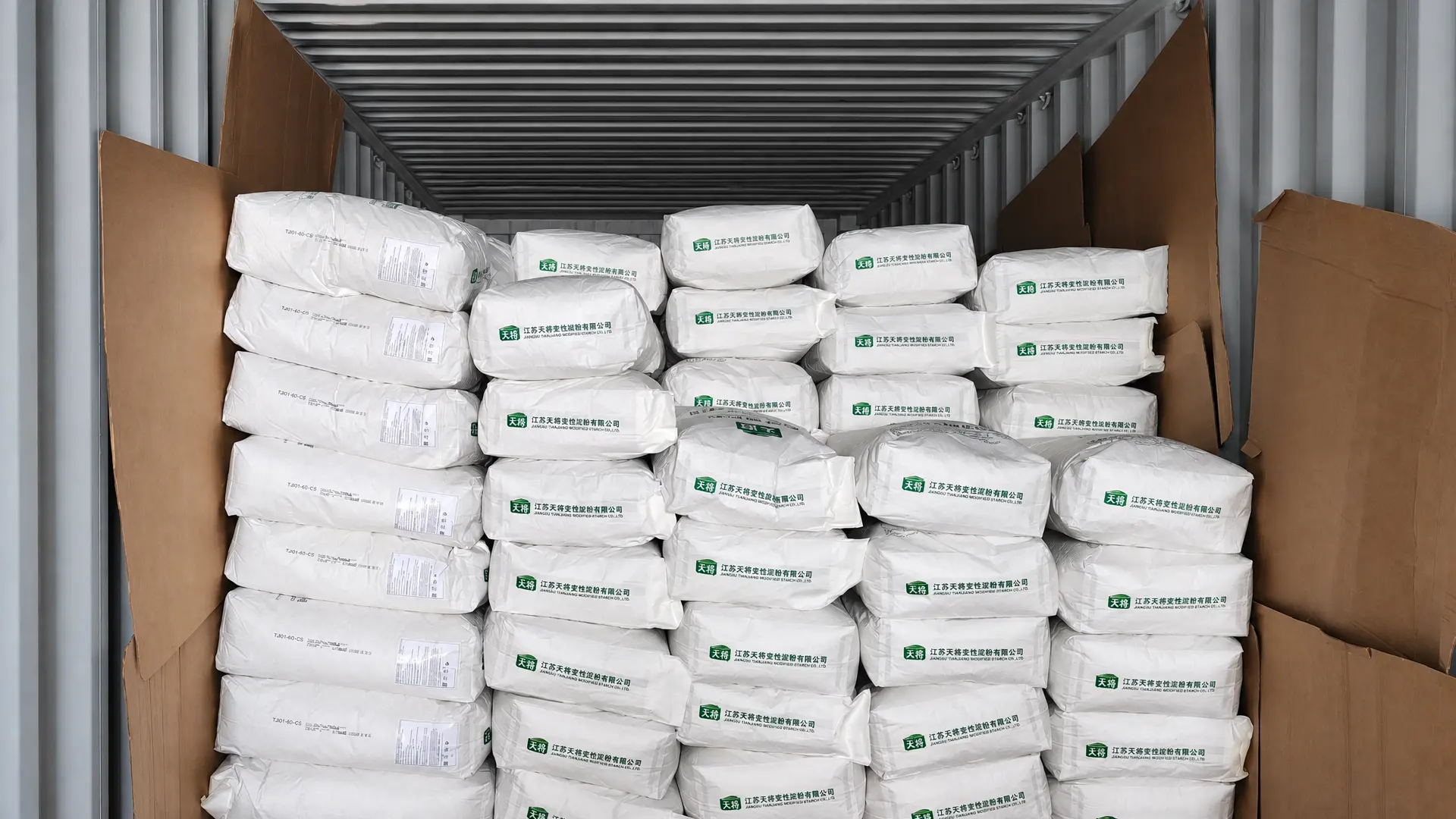 Modified starch bags stacked inside an export shipping container